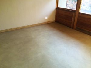 room with seamless cement floor